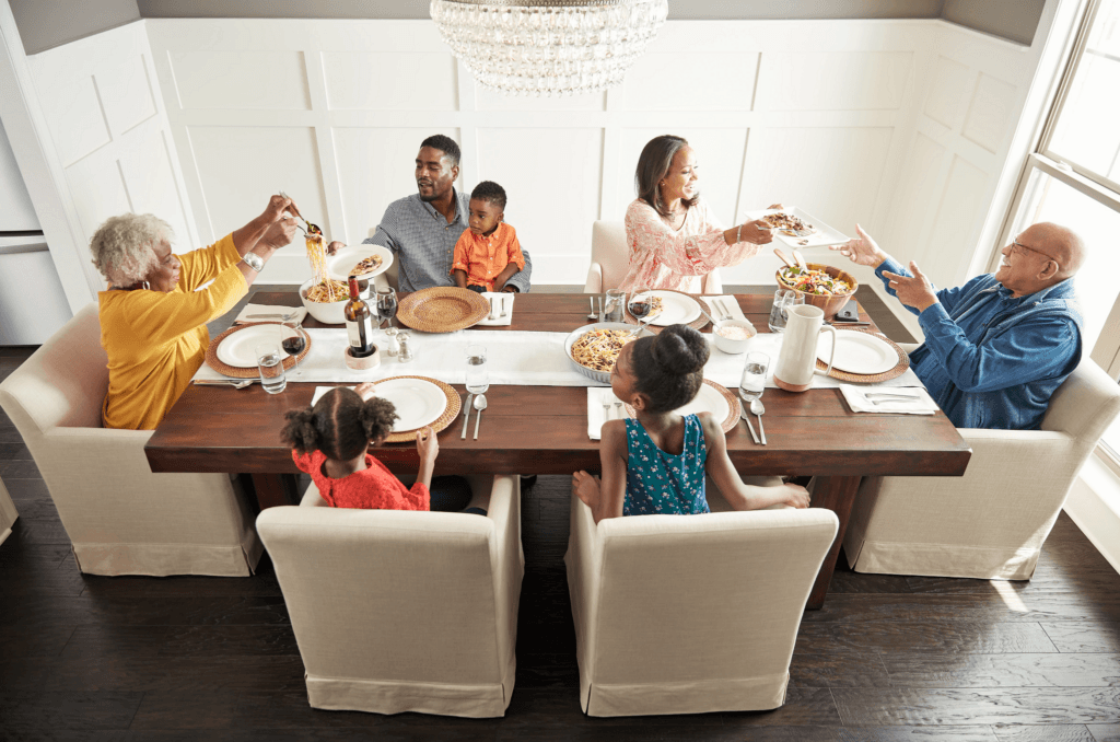 Family having breakfast at the dining table | Metro Flooring & Design